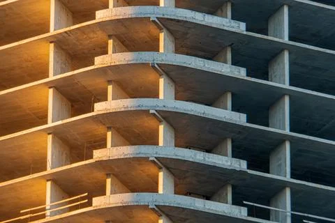 A construction site featuring the skeletal structure of a building under deve 写真素材