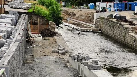 Construction Site Featuring Waterway Development and Enhancement in Urban Areas Stock Photos