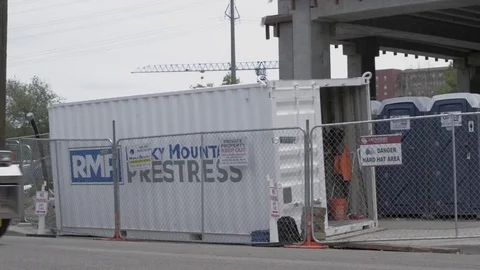 Construction Site Flat Bed Semi Truck tracking right Stock Footage 81456156