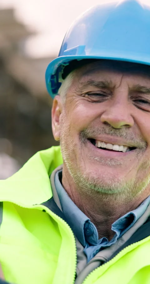 Construction site, foreman and man with smile for building development with Stock Footage 340873483