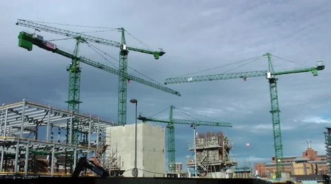 Construction site green tower crane cranes movement blue sky.mp4 Stock Footage 49197138