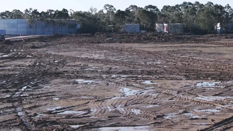 Construction site ground preparation with muddy terrain Stock Footage 341267470