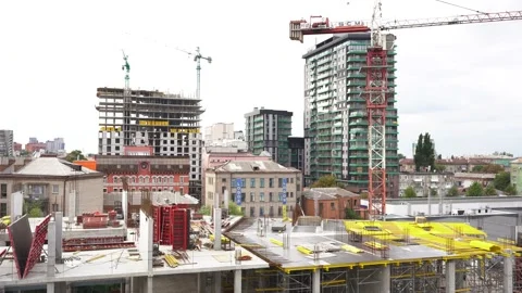 Construction site with heavy construction machinery in metropolis Stock Footage 161406202