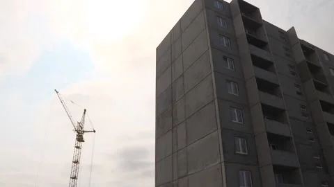 Construction site. High-rise cranes work on the construction site Stock Footage 98513146