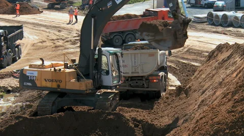 Construction site of a highway- crane and dump truck Stock Footage 40604229