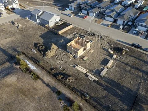 Construction site with a house in the background Stock Photos