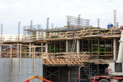 Construction site industry building structure development concrete and wood r Stock Photos