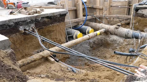 Construction site - installation of district heating lines 動画素材 301564985