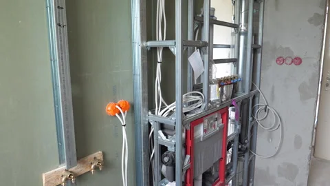 Construction site, installation of a sanitary system - modular construction Stock Footage 248533518