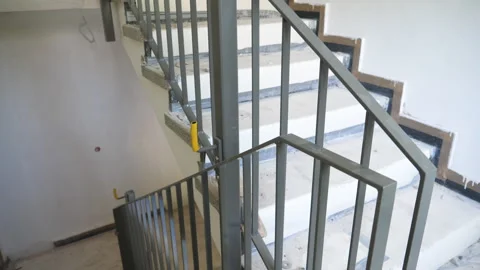 Construction site - installing a bannister rail 動画素材 248778972