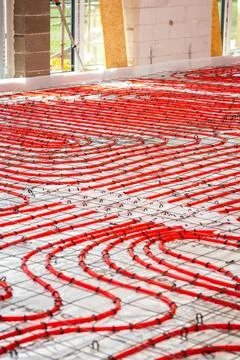 Construction Site Interior with Underfloor Heating Pipes Installed Stock-Fotos