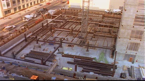 Construction site iron beams installed lower level Video stock 145617440