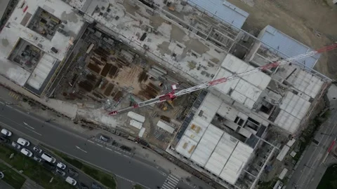 Construction site in La Chapelle area, Paris, France. Aerial top-down orbiting Stock Footage 303614954