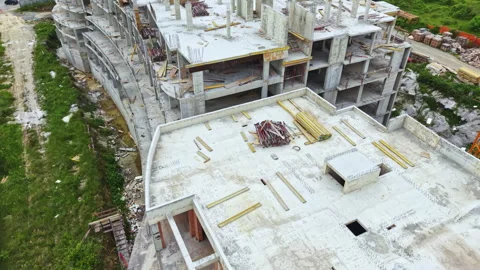 Construction site of a large building with unfinished structure and materials Stock Footage 340151313