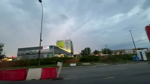 Construction site with large crane and red storage tanks Stock Footage 319498338