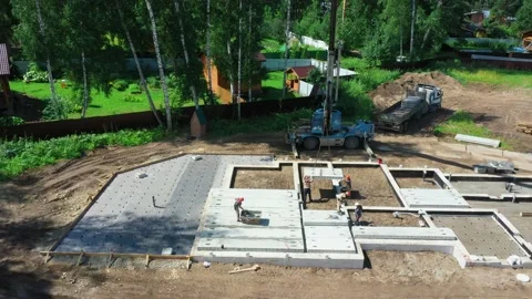 Construction site. Laying of slabs, bricks, concrete mortar. Stock Footage 167590733