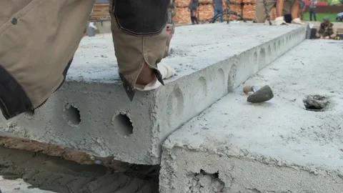Construction site. Laying of slabs, bricks, concrete mortar. Stock Footage 167590747