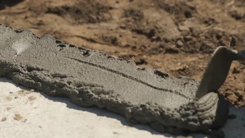 Construction site. Laying of slabs, bricks, concrete mortar. Stock Footage 167590749