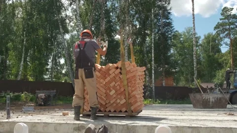 Construction site. Laying of slabs, bricks, concrete mortar. Stock Footage 167590790