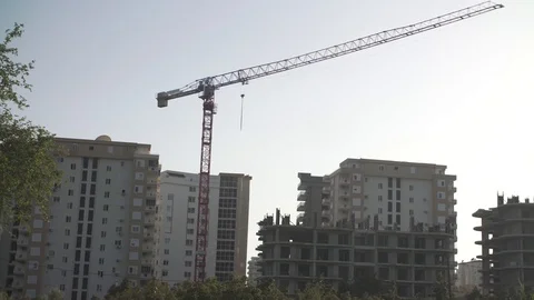 Construction site with a lifting construction crane Stock Footage 130157098
