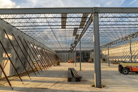 Construction site of logistic center with assembling of concrete and metal frame Stock Photos