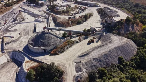 Construction site with machinery and material in a mountainous area Stock Footage 344540169