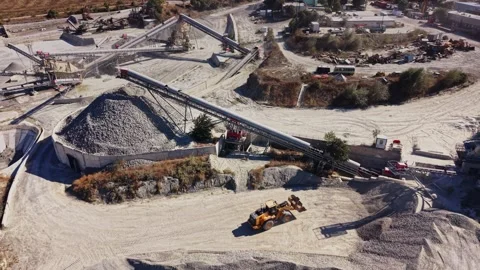 Construction site with machinery and materials in daytime Stock Footage 344540459