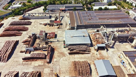 Construction site with machinery and stacks of materials in a large industrial Stock Footage 341575250