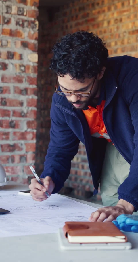 Construction site, man and architect writing for blueprint correction, drawing Stock Footage 337023124