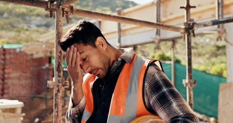 Construction site, man and headache with stress for building, renovation and Stock Footage 336260932