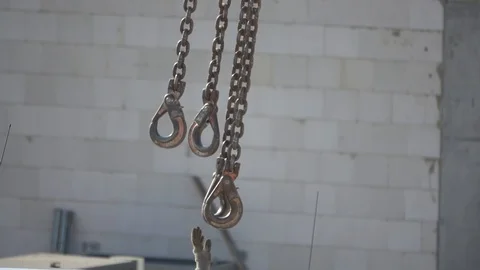 At the construction site, a man grabs hooks, 250 fps HD, slomo Stock Footage 107200846