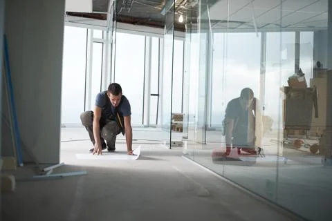 Construction site, man or builder with blueprint for building draft or Stock Photos