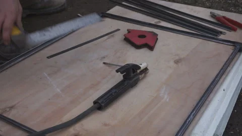 Construction site mass scene, workers pouring fresh concrete in the wheelbarrow  Video stock 86049101