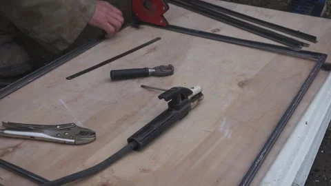 Construction site mass scene, workers pouring fresh concrete in the wheelbarrow  Video stock 86049348