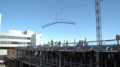 Construction Site - Material being Lowered by Crane Stock Footage 61331264
