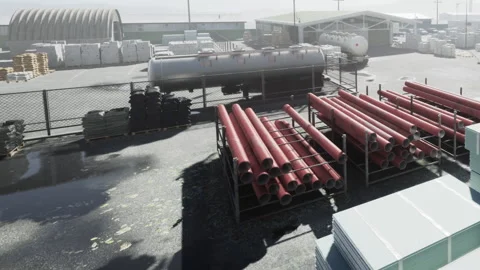 Construction site with metal pipes and storage facility in the background Stock Footage 344285193