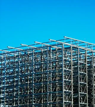 Construction site with a metal structure frame. Stock Photos