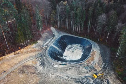 Construction site in the middle of a forest at an unknown location Stock Photos