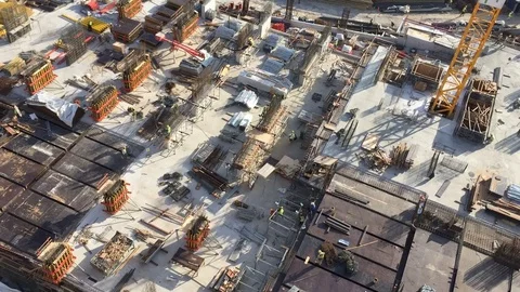 Construction site in midtown of modern city from top view Stock Footage 79301154