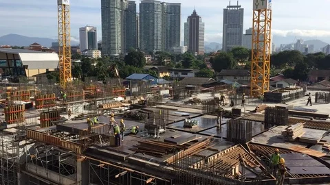 Construction site in midtown of modern city from top view Vídeo Stock 79301347