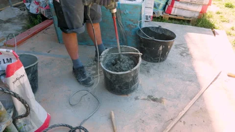 Construction site - mixing cement or plaster Stock-Footage 242619653