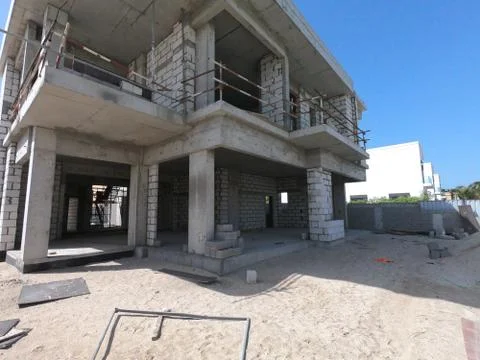 Construction Site of a modern house on a plot of land. No People present. Stock Photos