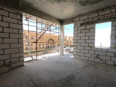 Construction Site of a modern house on a plot of land. No People present. Stock Photos