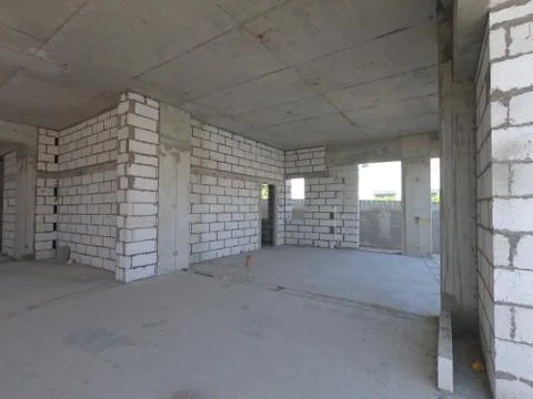 Construction Site of a modern house on a plot of land. No People present. Stock Photos