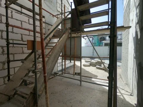 Construction Site of a modern house on a plot of land. No People present. Stock Photos