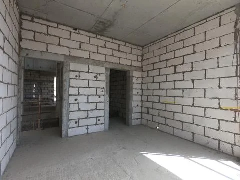 Construction Site of a modern house on a plot of land. No People present. Stock Photos