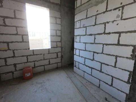 Construction Site of a modern house on a plot of land. No People present. Stock Photos