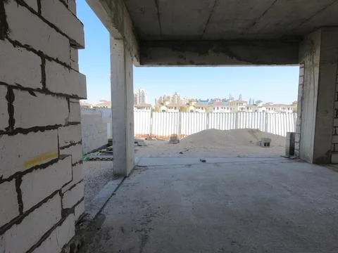 Construction Site of a modern house on a plot of land. No People present. Stock Photos