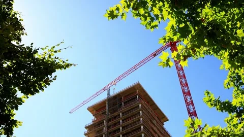 A construction site of a modern skyscraper 4k video 動画素材 344345980
