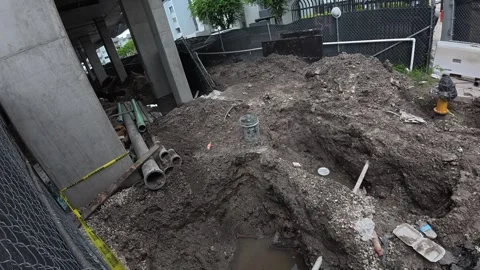 Construction site with multiple excavation areas Stock Footage 320221107